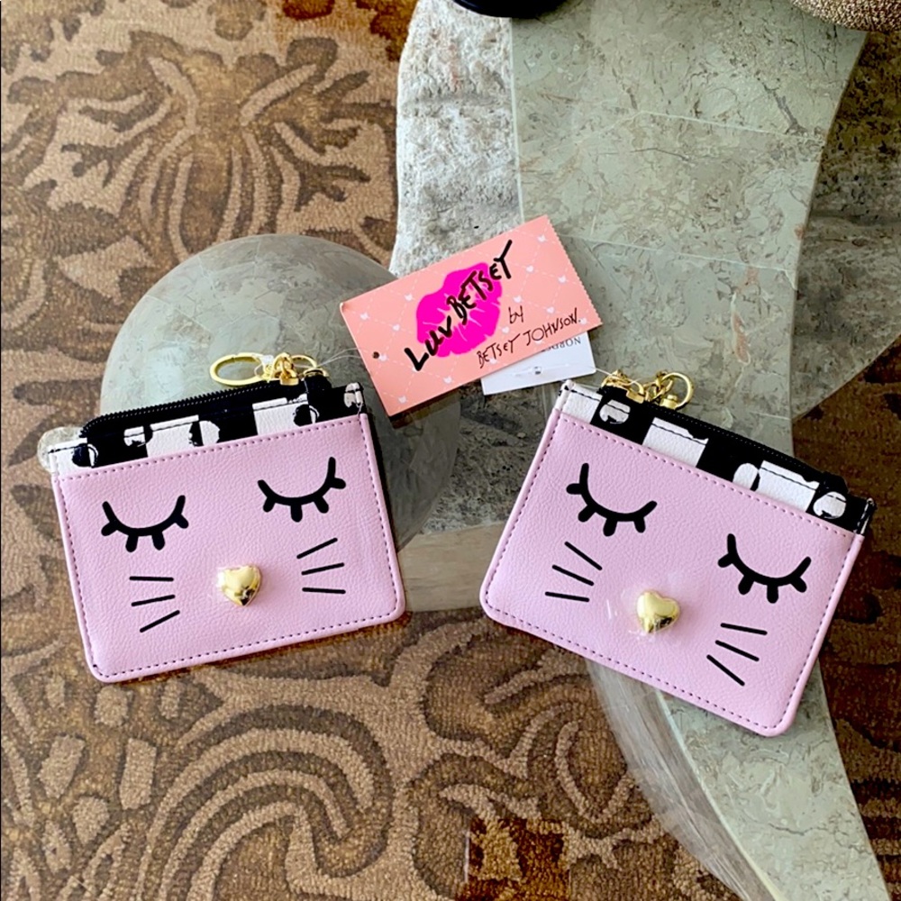 Betsey Johnson wallets.